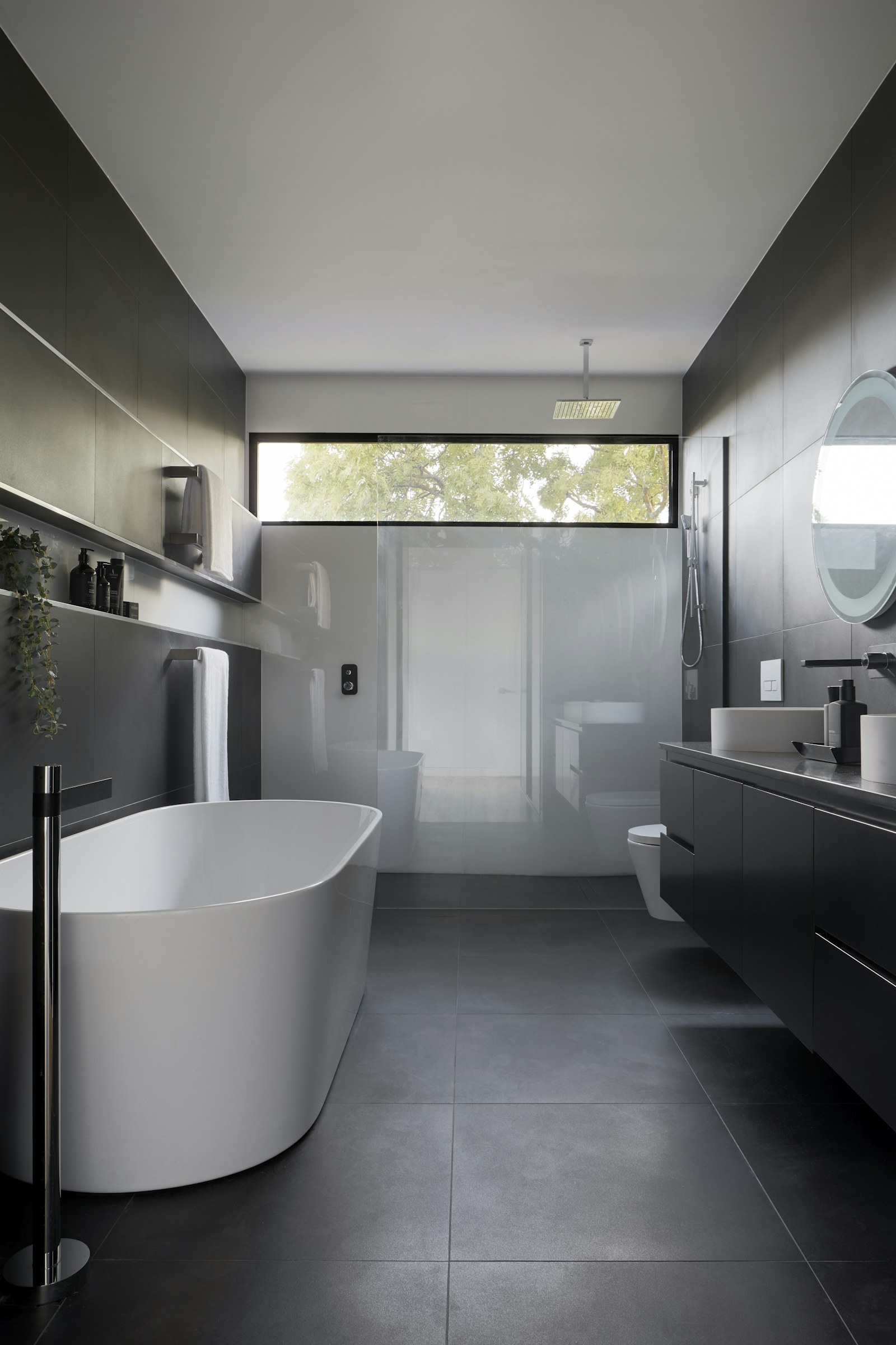 Modern bathroom with bright tile and polished fixtures