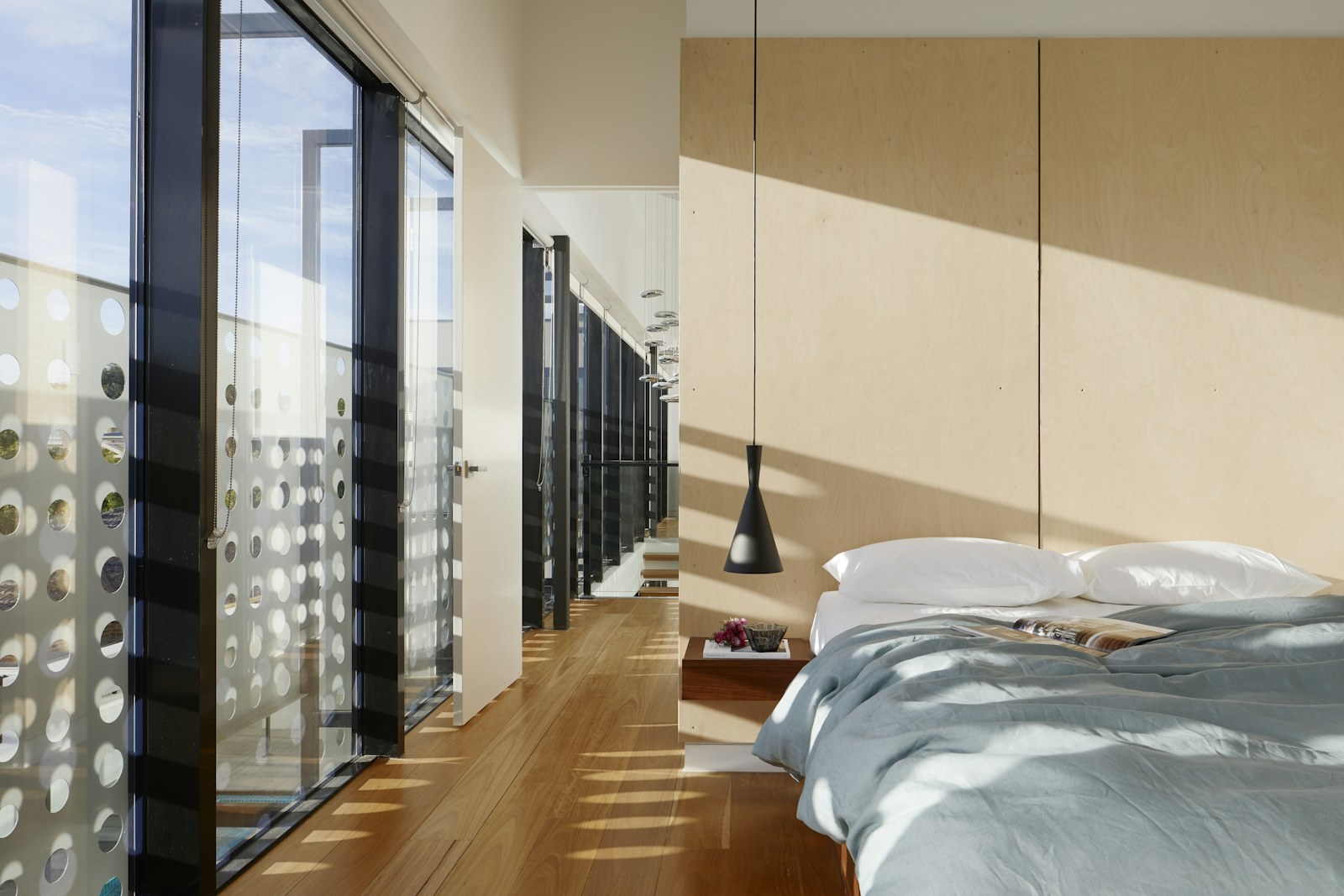 Modern home interior with neutral furniture and open sightlines